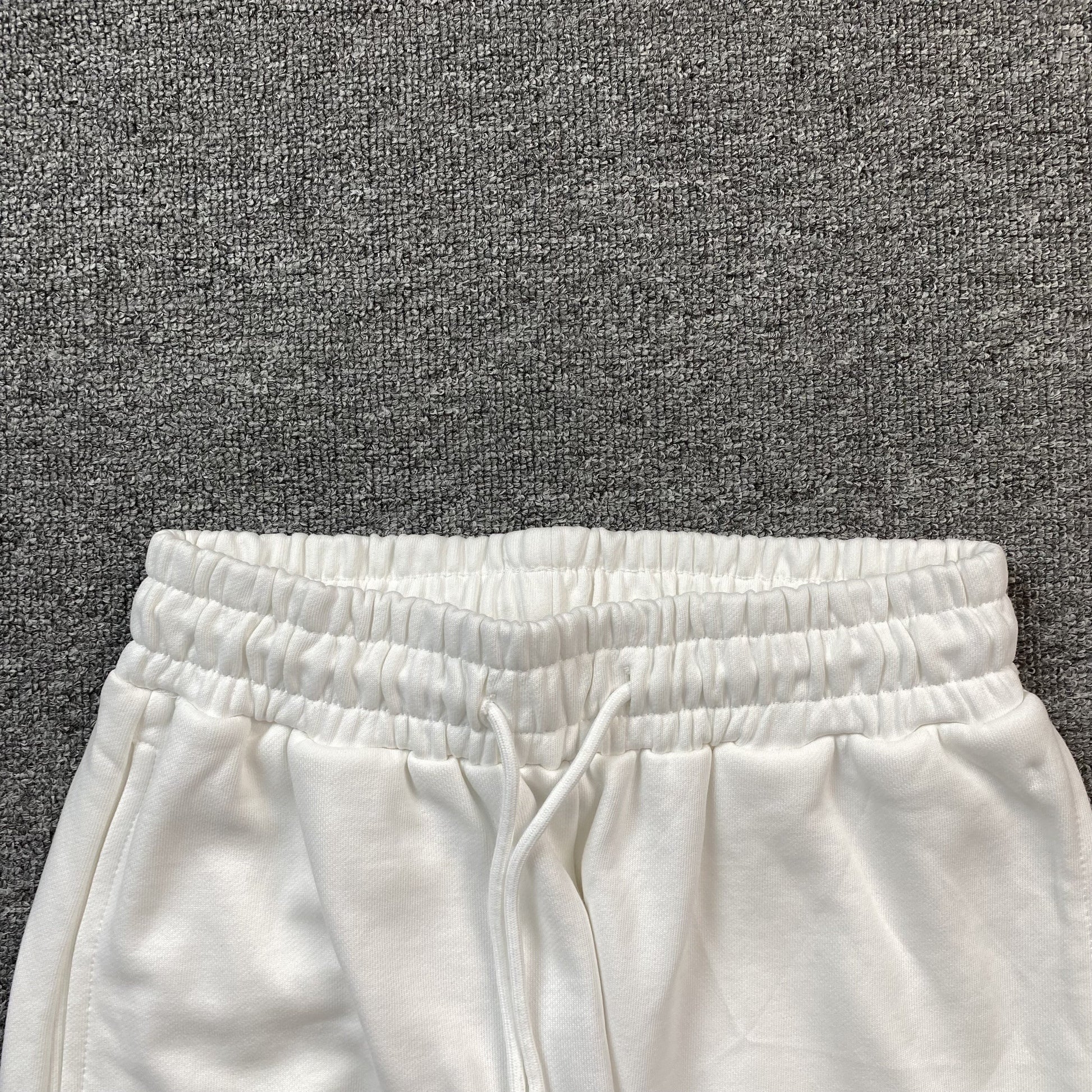 DENIM TEARS COTTON WREATH SWEATPANTS WHITE - Vanté®