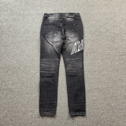 AMIRI VARSITY LOGO REPAIR JEANS - Vanté®