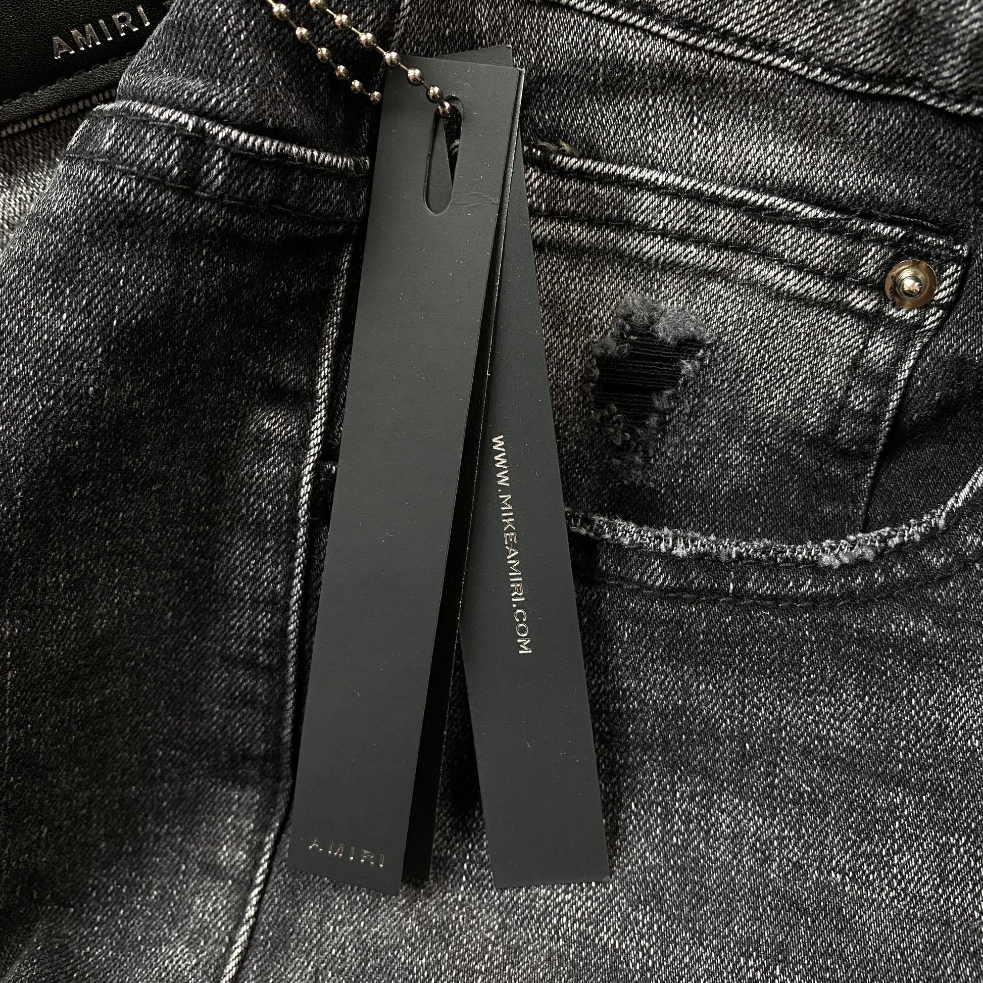 AMIRI VARSITY LOGO REPAIR JEANS - Vanté®