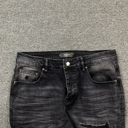AMIRI VARSITY LOGO REPAIR JEANS - Vanté®